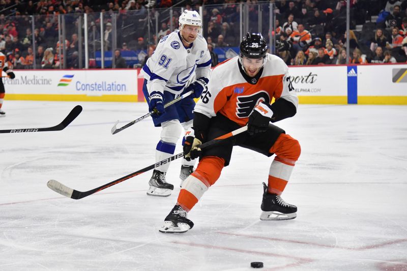 Jan 23, 2024; Philadelphia, Pennsylvania, USA; Philadelphia Flyers defenseman Sean Walker (26) and Tampa Bay Lightning center Steven Stamkos (91) battle for the puck during the second period at Wells Fargo Center. Mandatory Credit: Eric Hartline-USA TODAY Sports