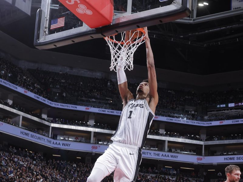 SACRAMENTO, CA - DECEMBER 1: Victor Wembanyama #1 of the San Antonio Spurs dunks the ball during the game against the Sacramento Kings on December 1, 2024 at Golden 1 Center in Sacramento, California. NOTE TO USER: User expressly acknowledges and agrees that, by downloading and or using this Photograph, user is consenting to the terms and conditions of the Getty Images License Agreement. Mandatory Copyright Notice: Copyright 2024 NBAE (Photo by Rocky Widner/NBAE via Getty Images)