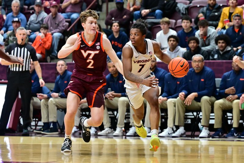 Feb 15, 2025; Blacksburg, Virginia, USA;  Virginia Cavaliers guard Dai Dai Ames (7) drives to the basket as Virginia Tech Hokies guard Jaden Schutt (2) defends at Cassell Coliseum. Mandatory Credit: Brian Bishop-Imagn Images