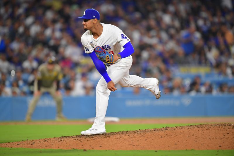 Sep 24, 2024; Los Angeles, California, USA; Los Angeles Dodgers pitcher Edgardo Henriquez (60) throws against the San Diego Padres during the sixth inning in his major league debut at Dodger Stadium. Mandatory Credit: Gary A. Vasquez-Imagn Images