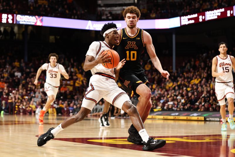 Jan 16, 2023; Minneapolis, Minnesota, USA; Illinois Fighting Illini guard Sencire Harris (1) drives to the basket while Minnesota Golden Gophers forward Jamison Battle (10) defends during the second half at Williams Arena. Mandatory Credit: Matt Krohn-USA TODAY Sports