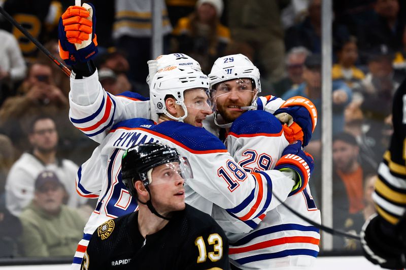 Mar 5, 2024; Boston, Massachusetts, USA; As Boston Bruins center Charlie Coyle (13) looks up at the clock, Edmonton Oilers center Leon Draisaitl (29) celebrates his game tying goal with left wing Zach Hyman (18) late in the third period at TD Garden. Mandatory Credit: Winslow Townson-USA TODAY Sports