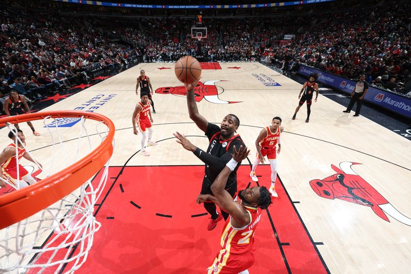 CHICAGO, IL - APRIL 1: Andre Drummond #3 of the Chicago Bulls drives to the basket during the game against the Atlanta Hawks on April 1, 2024 at United Center in Chicago, Illinois. NOTE TO USER: User expressly acknowledges and agrees that, by downloading and or using this photograph, User is consenting to the terms and conditions of the Getty Images License Agreement. Mandatory Copyright Notice: Copyright 2024 NBAE (Photo by Jeff Haynes/NBAE via Getty Images)