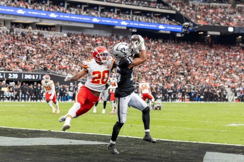 Las Vegas Raiders wide receiver Jakobi Meyers (16) catches a touchdown against the Kansas City Chiefs in an NFL football game, Sunday, Oct. 27, 2024, in Las Vegas. (AP Photo/Jeff Lewis)