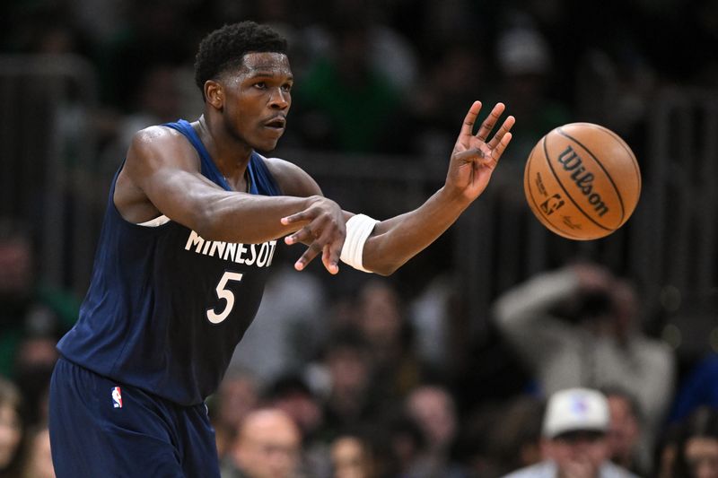 BOSTON, MASSACHUSETTS - NOVEMBER 24: Anthony Edwards #5 of the Minnesota Timberwolves passes the ball during the second quarter of a game against the Boston Celtics at the TD Garden on November 24, 2024 in Boston, Massachusetts. NOTE TO USER: User expressly acknowledges and agrees that, by downloading and or using this photograph, User is consenting to the terms and conditions of the Getty Images License Agreement. (Photo by Brian Fluharty/Getty Images)
