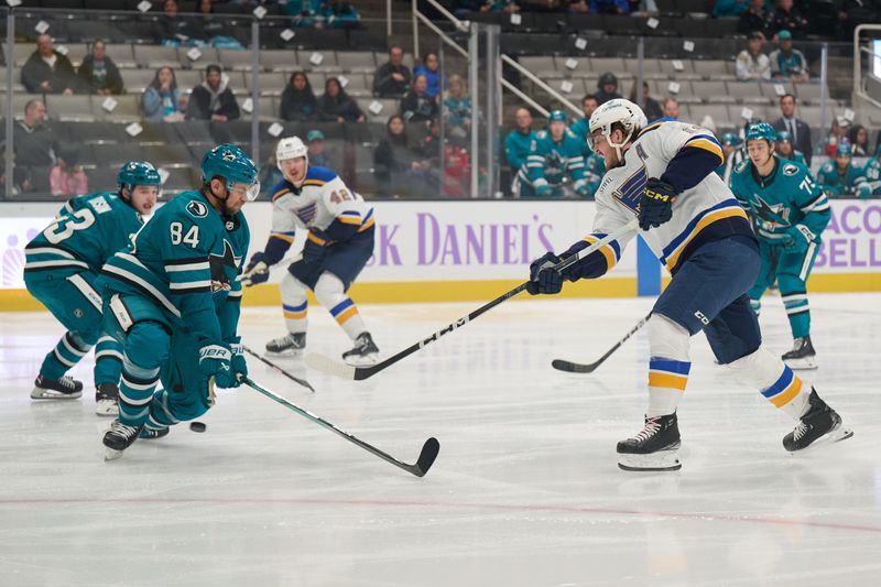 Nov 16, 2023; San Jose, California, USA; San Jose Sharks defenseman Jan Rutta (84) blocks a shot against St. Louis Blues center Robert Thomas (18) during the first period at SAP Center at San Jose. Mandatory Credit: Robert Edwards-USA TODAY Sports