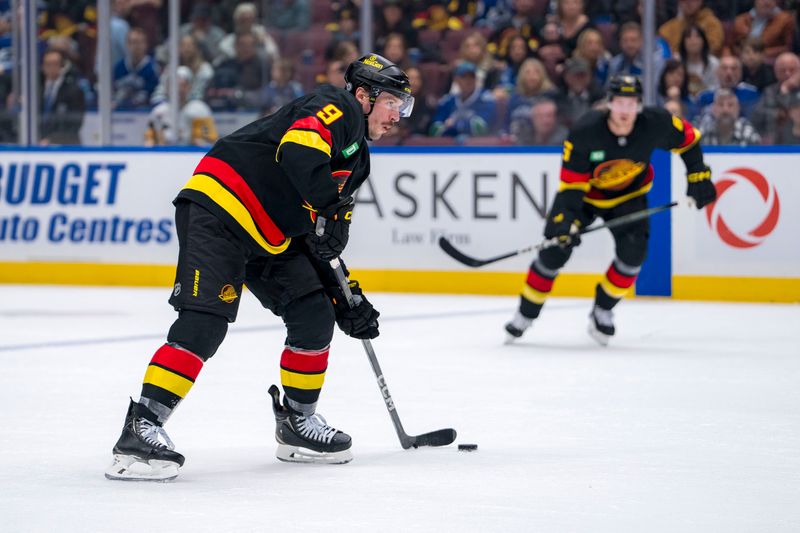 Oct 26, 2024; Vancouver, British Columbia, CAN; Vancouver Canucks forward J.T. Miller (9) looks to shoot against the Pittsburgh Penguins during the first period at Rogers Arena. Mandatory Credit: Bob Frid-Imagn Images