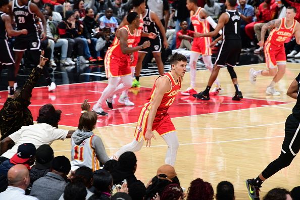 ATLANTA, GA - DECEMBER 6: Bogdan Bogdanovic #13 of the Atlanta Hawks celebrates a three point basket during the game against the Brooklyn Nets on December 6, 2023 at State Farm Arena in Atlanta, Georgia.  NOTE TO USER: User expressly acknowledges and agrees that, by downloading and/or using this Photograph, user is consenting to the terms and conditions of the Getty Images License Agreement. Mandatory Copyright Notice: Copyright 2023 NBAE (Photo by Scott Cunningham/NBAE via Getty Images)