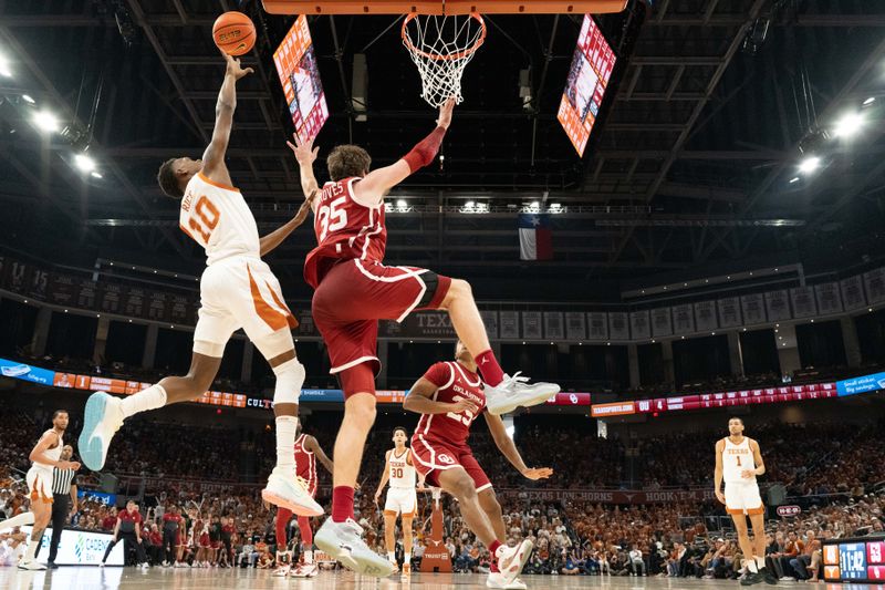 Feb 18, 2023; Austin, Texas, USA; Texas Longhorns guard Sir'Jabari Rice (10) shoots over Oklahoma Sooners forward Tanner Groves (35) during the second half at Moody Center. Mandatory Credit: Scott Wachter-USA TODAY Sports