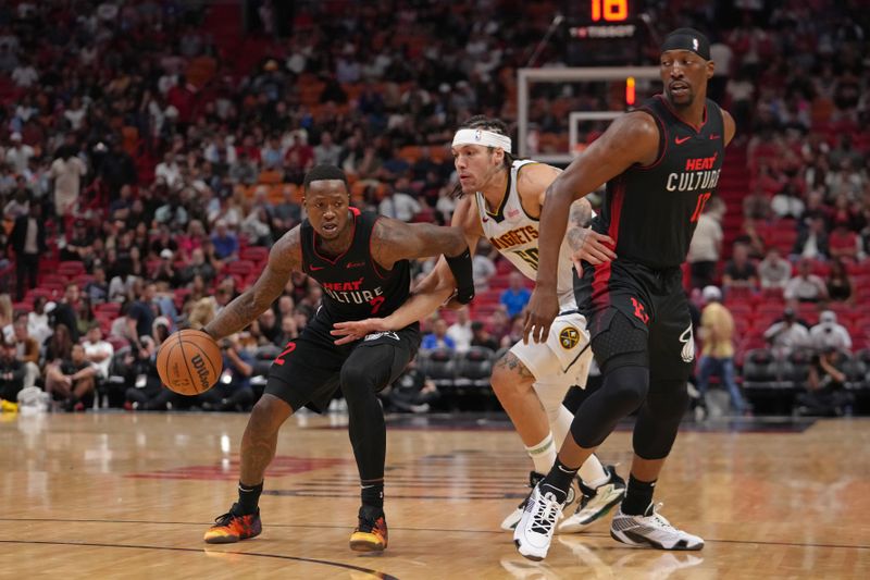 MIAMI, FL - MARCH 13: Terry Rozier #2 of the Miami Heat dribbles the ball during the game against the Denver Nuggets on March 13, 2024 at Kaseya Center in Miami, Florida. NOTE TO USER: User expressly acknowledges and agrees that, by downloading and or using this Photograph, user is consenting to the terms and conditions of the Getty Images License Agreement. Mandatory Copyright Notice: Copyright 2024 NBAE (Photo by Eric Espada/NBAE via Getty Images)