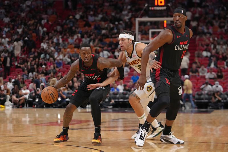 MIAMI, FL - MARCH 13: Terry Rozier #2 of the Miami Heat dribbles the ball during the game against the Denver Nuggets on March 13, 2024 at Kaseya Center in Miami, Florida. NOTE TO USER: User expressly acknowledges and agrees that, by downloading and or using this Photograph, user is consenting to the terms and conditions of the Getty Images License Agreement. Mandatory Copyright Notice: Copyright 2024 NBAE (Photo by Eric Espada/NBAE via Getty Images)