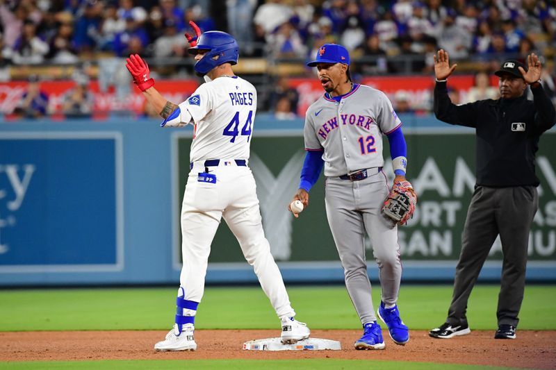 June 3, 2025; Los Angeles, California, USA; Los Angeles Dodgers center fielder Andy Pages (44) reaches second against the New York Mets during the fourth inning at Dodger Stadium. Mandatory Credit: Gary A. Vasquez-Imagn Images