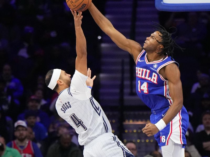 PHILADELPHIA, PA - DECEMBER 4: Ricky Council IV #14 of the Philadelphia 76ers blocks the shot during the game against the Orlando Magic on December 4, 2024 at the Wells Fargo Center in Philadelphia, Pennsylvania NOTE TO USER: User expressly acknowledges and agrees that, by downloading and/or using this Photograph, user is consenting to the terms and conditions of the Getty Images License Agreement. Mandatory Copyright Notice: Copyright 2024 NBAE (Photo by Jesse D. Garrabrant/NBAE via Getty Images)