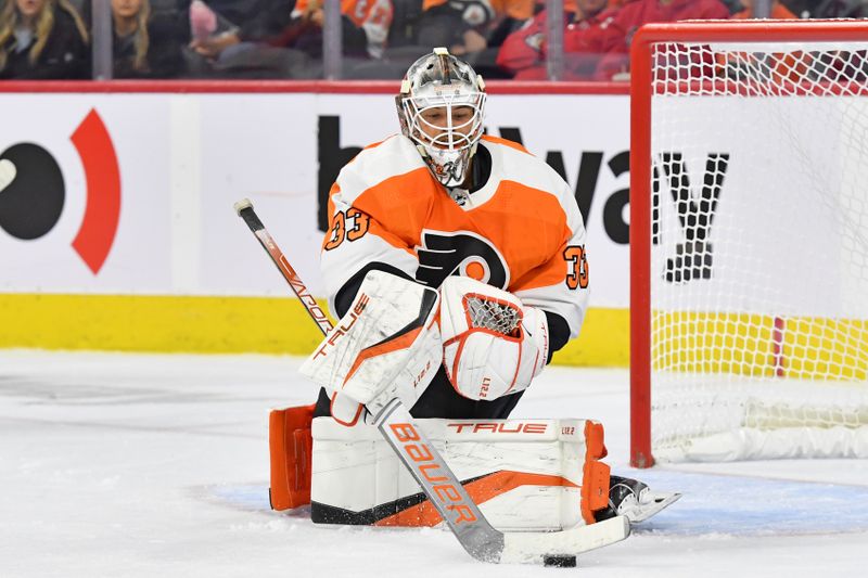 Sep 28, 2022; Philadelphia, Pennsylvania, USA; Philadelphia Flyers goaltender Samuel Ersson (33) makes a save against the Washington Capitals during the third period at Wells Fargo Center. Mandatory Credit: Eric Hartline-USA TODAY Sports