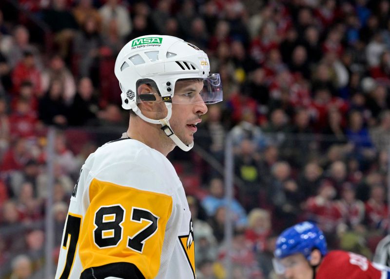 Oct 14, 2024; Montreal, Quebec, CAN; Pittsburgh Penguins forward Sidney Crosby (87) prepares for a face off against the Montreal Canadiens during the second period at the Bell Centre. Mandatory Credit: Eric Bolte-Imagn Images