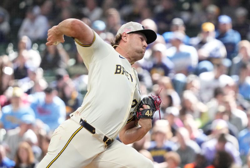 May 18, 2025; Milwaukee, Wisconsin, USA; Milwaukee Brewers pitcher Trevor Megill (29) delivers a pitch against the Minnesota Twins in the ninth inning at American Family Field. Mandatory Credit: Michael McLoone-Imagn Images