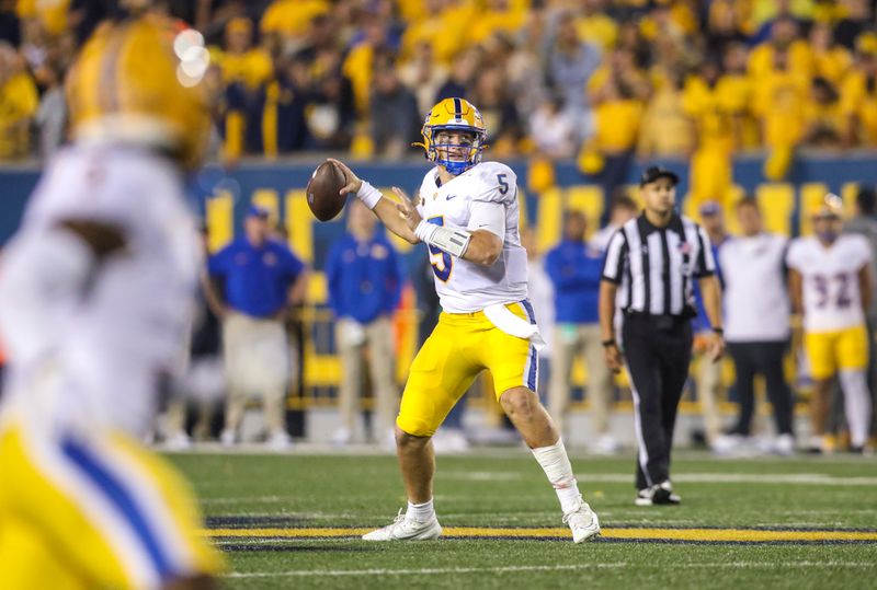 Sep 16, 2023; Morgantown, West Virginia, USA; Pittsburgh Panthers quarterback Phil Jurkovec (5) throws a pass during the fourth quarter against the West Virginia Mountaineers at Mountaineer Field at Milan Puskar Stadium. Mandatory Credit: Ben Queen-USA TODAY Sports