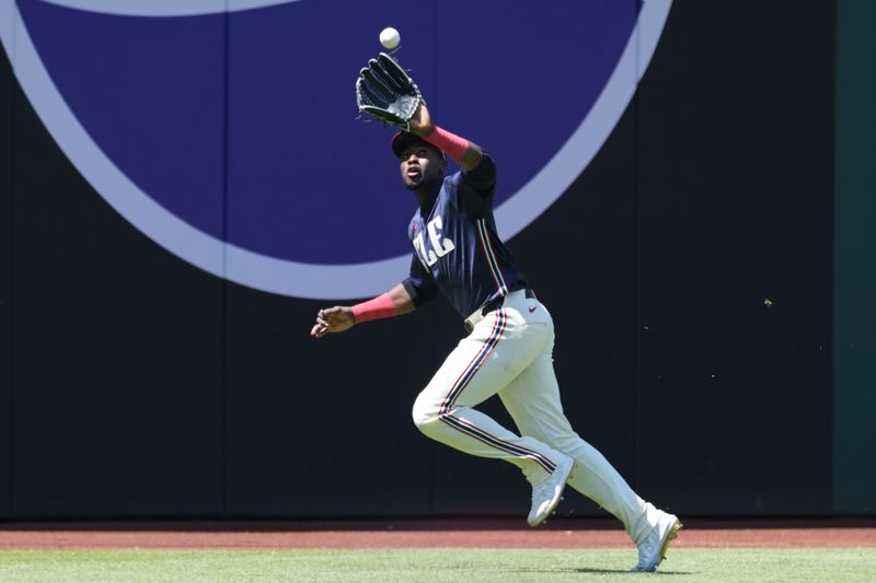 May 19, 2024; Cleveland, Ohio, USA; Cleveland Guardians left fielder Estevan Florial (90) catches a ball hit by Minnesota Twins designated hitter Trevor Larnach (9) during the sixth inning at Progressive Field. Mandatory Credit: Ken Blaze-USA TODAY Sports