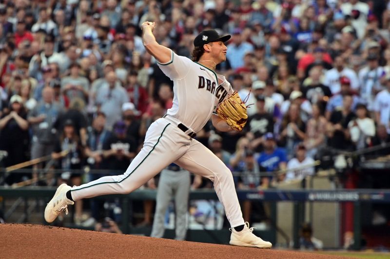 Oct 30, 2023; Phoenix, Arizona, USA; Arizona Diamondbacks starting pitcher Brandon Pfaadt (32) pitches against the Texas Rangers in the first inning in game three of the 2023 World Series at Chase Field. Mandatory Credit: Matt Kartozian-USA TODAY Sports