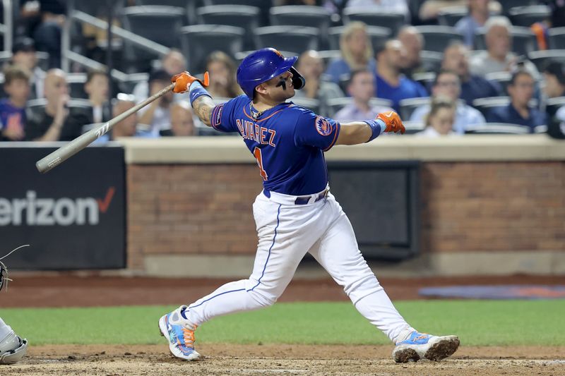 Jul 18, 2023; New York City, New York, USA; New York Mets catcher Francisco Alvarez (4) follows through on a two run home run against the Chicago White Sox during the sixth inning at Citi Field. Mandatory Credit: Brad Penner-USA TODAY Sports