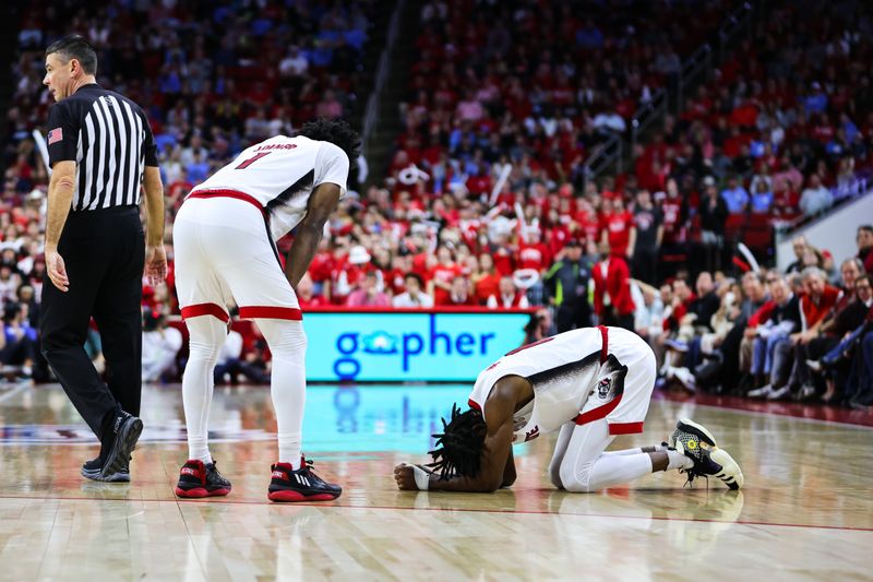 Feb 19, 2023; Raleigh, North Carolina, USA; North Carolina State Wolfpack guard Terquavion Smith (0) reacts while guard Jarkel Joiner (1) looks on during the second half of the game against North Carolina Tar Heels at PNC Arena. Mandatory Credit: Jaylynn Nash-USA TODAY Sports