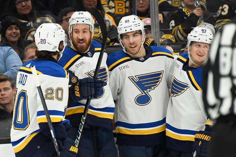 Mar 11, 2024; Boston, Massachusetts, USA;  St. Louis Blues right wing Kevin Hayes (12) celebrates his goal with his teammates during the second period against the Boston Bruins at TD Garden. Mandatory Credit: Bob DeChiara-USA TODAY Sports