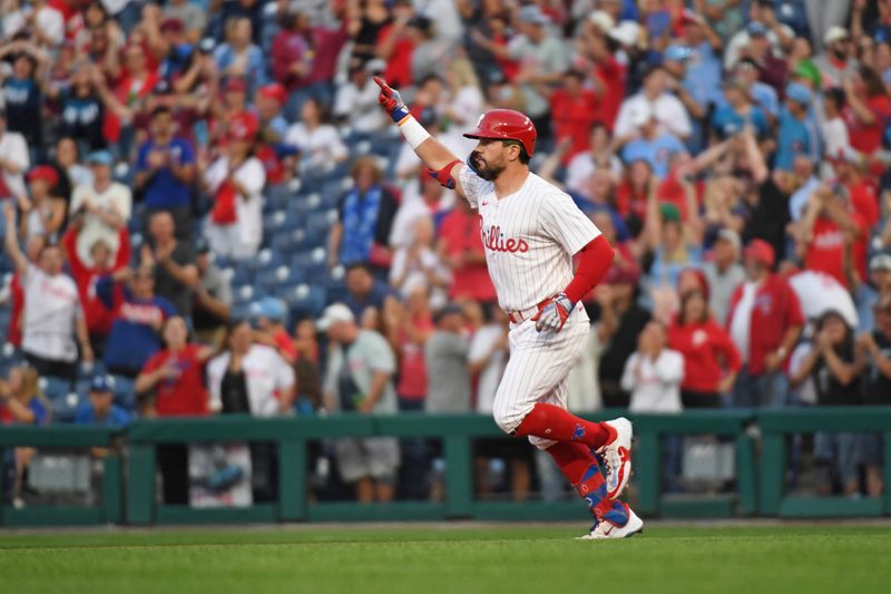 Sep 10, 2024; Philadelphia, Pennsylvania, USA; Philadelphia Phillies designated hitter Kyle Schwarber (12) celebrates his home run during the first inning against the Tampa Bay Rays at Citizens Bank Park. Mandatory Credit: Eric Hartline-Imagn Images