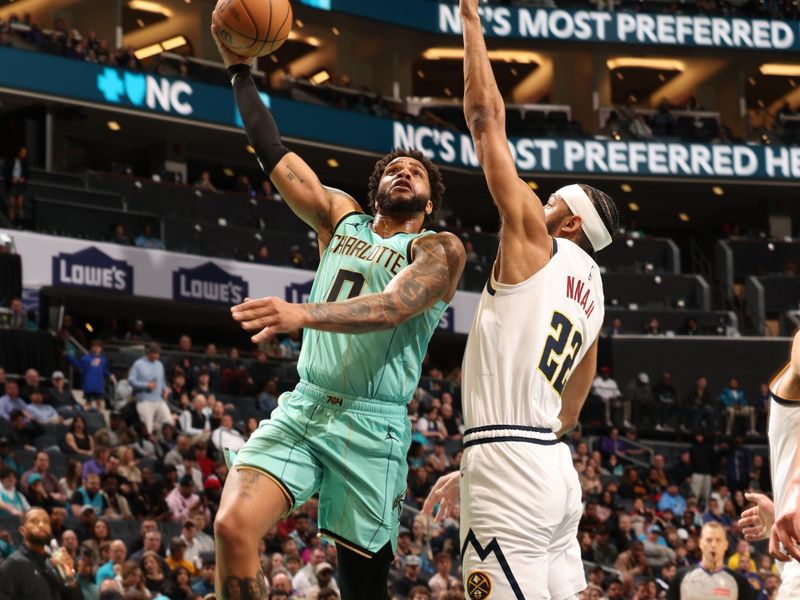 CHARLOTTE, NC - FEBRUARY 1: Miles Bridges #0 of the Charlotte Hornets drives to the basket during the game against the Denver Nuggets on February 1, 2025 at Spectrum Center in Charlotte, North Carolina. NOTE TO USER: User expressly acknowledges and agrees that, by downloading and or using this photograph, User is consenting to the terms and conditions of the Getty Images License Agreement. Mandatory Copyright Notice: Copyright 2025 NBAE (Photo by Kent Smith/NBAE via Getty Images)