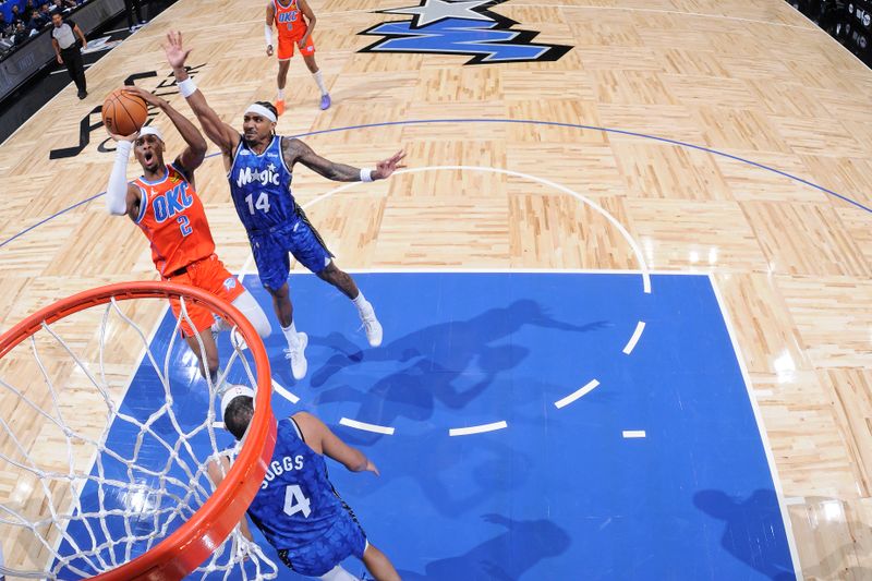 ORLANDO, FL - FEBRUARY 13: Shai Gilgeous-Alexander #2 of the Oklahoma City Thunder shoots the ball during the game against the Orlando Magic on February 13, 2024 at the Kia Center in Orlando, Florida. NOTE TO USER: User expressly acknowledges and agrees that, by downloading and or using this photograph, User is consenting to the terms and conditions of the Getty Images License Agreement. Mandatory Copyright Notice: Copyright 2024 NBAE (Photo by Fernando Medina/NBAE via Getty Images)