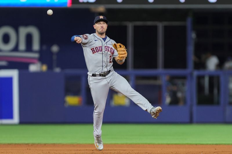 Aug 15, 2023; Miami, Florida, USA; Houston Astros third baseman Alex Bregman (2) throws to first and retires Miami Marlins second baseman Luis Arraez (not pictured) during the seventh inning at loanDepot Park. Mandatory Credit: Sam Navarro-USA TODAY Sports