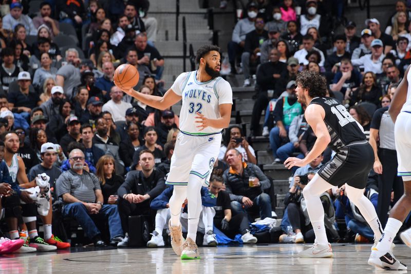 SAN ANTONIO, TX - JANUARY 27: Karl-Anthony Towns #32 of the Minnesota Timberwolves handles the ball during the game against the San Antonio Spurs on January 27, 2024 at the Frost Bank Center in San Antonio, Texas. NOTE TO USER: User expressly acknowledges and agrees that, by downloading and or using this photograph, user is consenting to the terms and conditions of the Getty Images License Agreement. Mandatory Copyright Notice: Copyright 2024 NBAE (Photos by Michael Gonzales/NBAE via Getty Images)