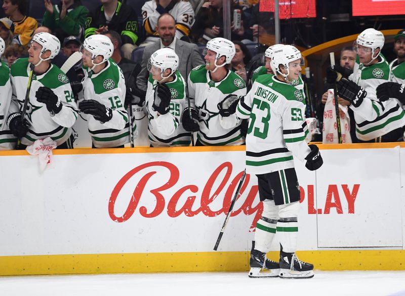 Oct 13, 2022; Nashville, Tennessee, USA; Dallas Stars center Wyatt Johnston (53) celebrates with teammates after a goal during the third period against the Nashville Predators at Bridgestone Arena. Mandatory Credit: Christopher Hanewinckel-USA TODAY Sports