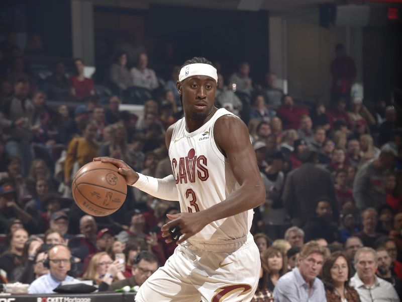 CLEVELAND, OH - MARCH 11: Caris LeVert #3 of the Cleveland Cavaliers handles the ball during the game against the Phoenix Suns on March 11, 2024 at Rocket Mortgage FieldHouse in Cleveland, Ohio. NOTE TO USER: User expressly acknowledges and agrees that, by downloading and/or using this Photograph, user is consenting to the terms and conditions of the Getty Images License Agreement. Mandatory Copyright Notice: Copyright 2024 NBAE (Photo by David Liam Kyle/NBAE via Getty Images)