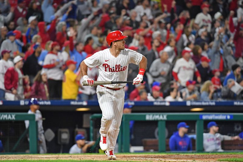 Sep 22, 2023; Philadelphia, Pennsylvania, USA; Philadelphia Phillies catcher J.T. Realmuto (10) watches his three run home run during the sixth inning against the New York Mets at Citizens Bank Park. Mandatory Credit: Eric Hartline-USA TODAY Sports