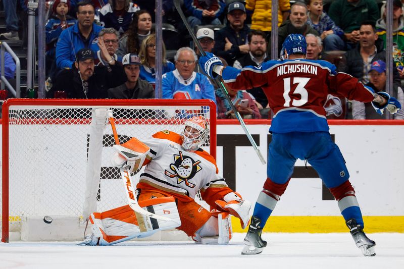 Jan 21, 2026; Denver, Colorado, USA; Colorado Avalanche right wing Valeri Nichushkin (13) celebrates as the puck hits the back of the net behind Anaheim Ducks goaltender Lukas Dostal (1) on an Avalanche goal in the third period at Ball Arena. Mandatory Credit: Isaiah J. Downing-Imagn Images