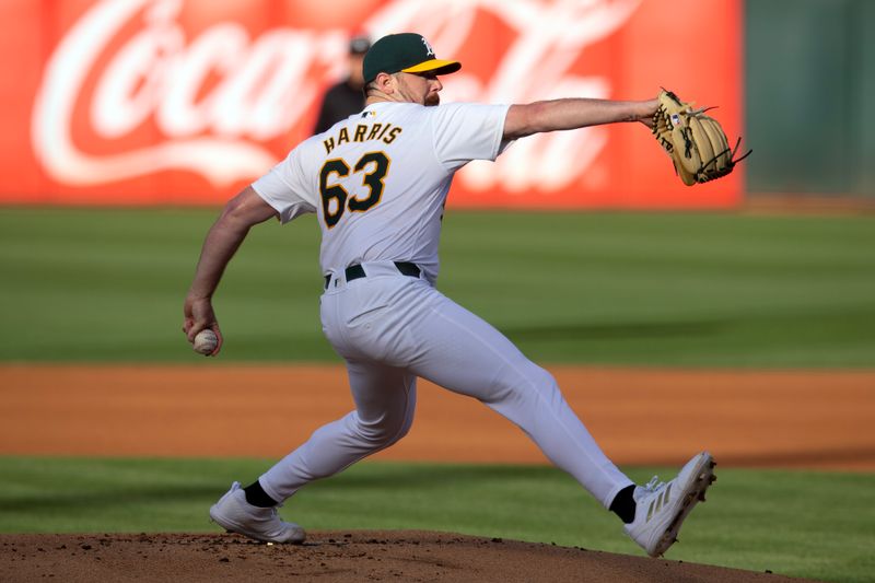 Jun 7, 2024; Oakland, California, USA; Oakland Athletics starting pitcher Hogan Harris (63) delivers a pitch against the Toronto Blue Jays during the first inning at Oakland-Alameda County Coliseum. Mandatory Credit: D. Ross Cameron-USA TODAY Sports