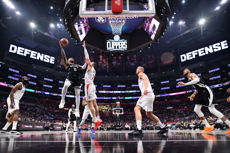 LOS ANGELES, CA - MARCH 10: Damian Lillard #0 of the Milwaukee Bucks shoots the ball during the game against the LA Clippers on March 10, 2024 at Crypto.Com Arena in Los Angeles, California. NOTE TO USER: User expressly acknowledges and agrees that, by downloading and/or using this Photograph, user is consenting to the terms and conditions of the Getty Images License Agreement. Mandatory Copyright Notice: Copyright 2024 NBAE (Photo by Adam Pantozzi/NBAE via Getty Images)