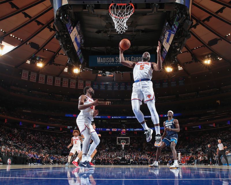 NEW YORK, NY - OCTOBER 13: Precious Achiuwa #5 of the New York Knicks rebounds the ball during the game on October 13, 2024 at Madison Square Garden in New York City, New York.  NOTE TO USER: User expressly acknowledges and agrees that, by downloading and or using this photograph, User is consenting to the terms and conditions of the Getty Images License Agreement. Mandatory Copyright Notice: Copyright 2024 NBAE  (Photo by David L. Nemec/NBAE via Getty Images)