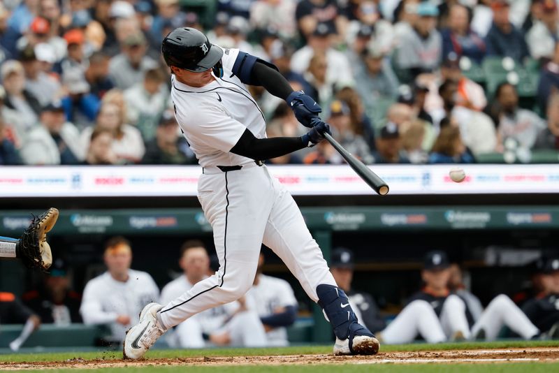 Apr 19, 2025; Detroit, Michigan, USA;  Detroit Tigers catcher Dillon Dingler (13) hits a double in the second inning against the Kansas City Royals at Comerica Park. Mandatory Credit: Rick Osentoski-Imagn Images