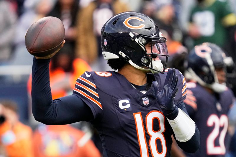 Chicago Bears' Caleb Williams warms up before an NFL football game against the Green Bay Packers Sunday, Nov. 17, 2024, in Chicago. (AP Photo/Nam Y. Huh)