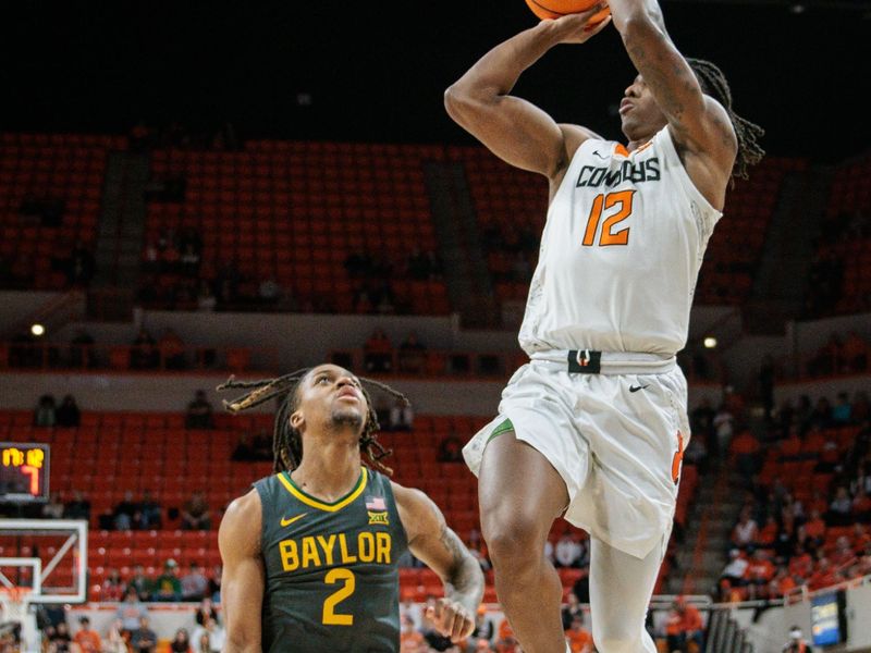 Jan 6, 2024; Stillwater, Oklahoma, USA; Oklahoma State Cowboys guard Javon Small (12) puts up a shot over Baylor Bears guard Jayden Nunn (2) during the first half at Gallagher-Iba Arena. Mandatory Credit: William Purnell-USA TODAY Sports