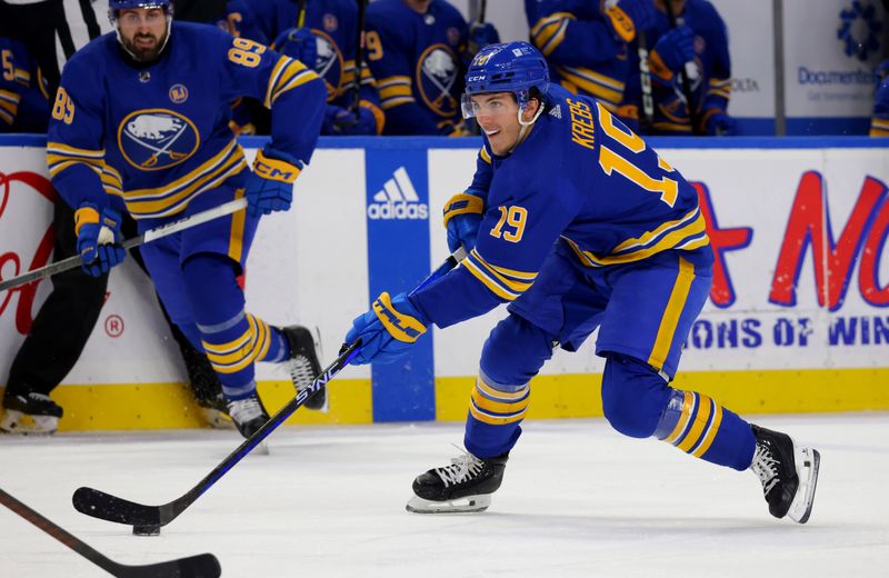 Feb 15, 2024; Buffalo, New York, USA;  Buffalo Sabres center Peyton Krebs (19) skates up ice with the puck during the second period against the Florida Panthers at KeyBank Center. Mandatory Credit: Timothy T. Ludwig-USA TODAY Sports