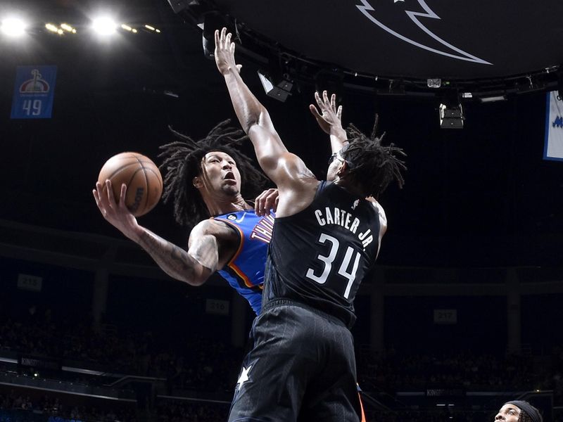 ORLANDO, FL - JANUARY 4: Jaylin Williams #6 of the Oklahoma City Thunder goes to the basket against the Orlando Magic on January 4, 2023 at Amway Center in Orlando, Florida. NOTE TO USER: User expressly acknowledges and agrees that, by downloading and or using this photograph, User is consenting to the terms and conditions of the Getty Images License Agreement. Mandatory Copyright Notice: Copyright 2023 NBAE (Photo by Fernando Medina/NBAE via Getty Images)