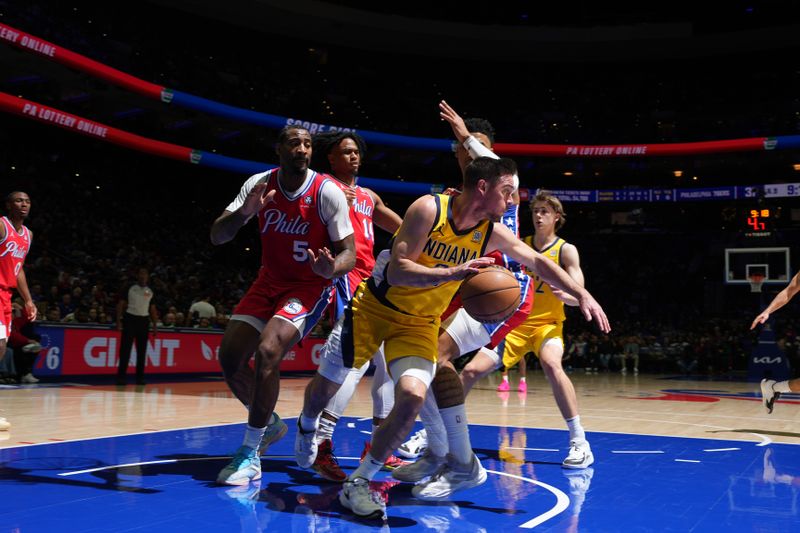 PHILADELPHIA, PA - DECEMBER 13: T.J. McConnell #9 of the Indiana Pacers dribbles the ball during the game against the Philadelphia 76ers on December 13, 2024 at the Wells Fargo Center in Philadelphia, Pennsylvania NOTE TO USER: User expressly acknowledges and agrees that, by downloading and/or using this Photograph, user is consenting to the terms and conditions of the Getty Images License Agreement. Mandatory Copyright Notice: Copyright 2024 NBAE (Photo by Jesse D. Garrabrant/NBAE via Getty Images)