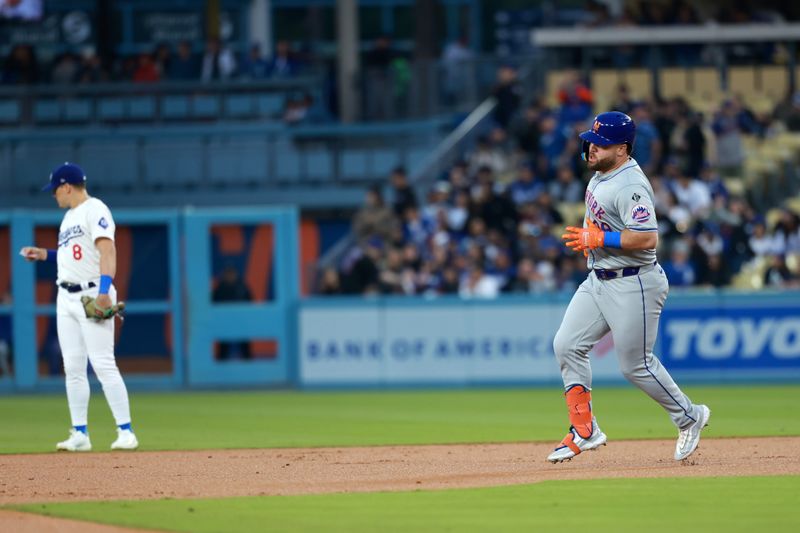 Apr 19, 2024; Los Angeles, California, USA;  New York Mets designated hitter DJ Stewart (29) runs around bases after hitting a home run during the second inning against the Los Angeles Dodgers at Dodger Stadium. Mandatory Credit: Kiyoshi Mio-USA TODAY Sports