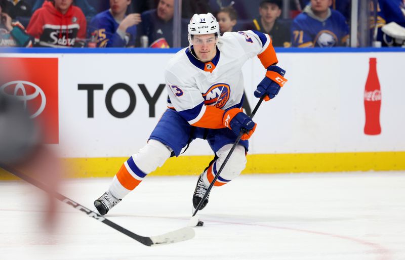 Mar 14, 2024; Buffalo, New York, USA;  New York Islanders center Mathew Barzal (13) looks to make a pass during the first period against the Buffalo Sabres at KeyBank Center. Mandatory Credit: Timothy T. Ludwig-USA TODAY Sports