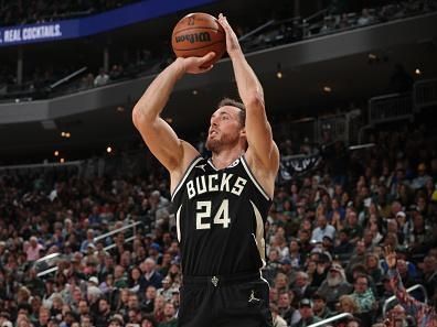 MILWAUKEE, WI - NOVEMBER 18: Pat Connaughton #24 of the Milwaukee Bucks shoots the ball during the game against the Dallas Mavericks on November 18, 2023 at the Fiserv Forum Center in Milwaukee, Wisconsin. NOTE TO USER: User expressly acknowledges and agrees that, by downloading and or using this Photograph, user is consenting to the terms and conditions of the Getty Images License Agreement. Mandatory Copyright Notice: Copyright 2023 NBAE (Photo by Gary Dineen/NBAE via Getty Images).