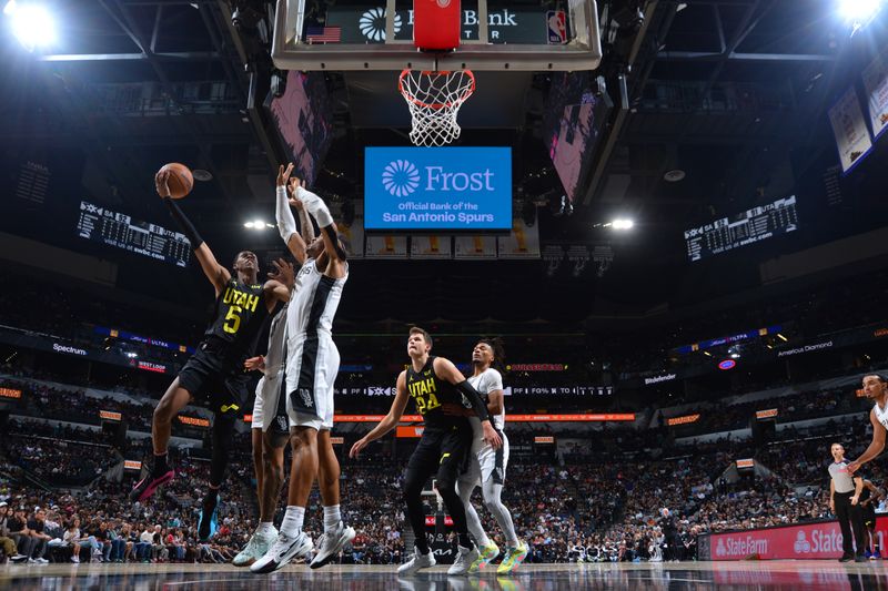 SAN ANTONIO, TX - OCTOBER 12: Cody Williams #5 of the Utah Jazz shoots the ball during the game against the San Antonio Spurs during a NBA pre season game on October 12, 2024 at the Frost Bank Center in San Antonio, Texas. NOTE TO USER: User expressly acknowledges and agrees that, by downloading and or using this photograph, user is consenting to the terms and conditions of the Getty Images License Agreement. Mandatory Copyright Notice: Copyright 2024 NBAE (Photos by Michael Gonzales/NBAE via Getty Images)