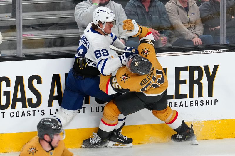 Mar 5, 2025; Las Vegas, Nevada, USA; Toronto Maple Leafs right wing William Nylander (88) checks Vegas Golden Knights right wing Keegan Kolesar (55) during the third period at T-Mobile Arena. Mandatory Credit: Stephen R. Sylvanie-Imagn Images