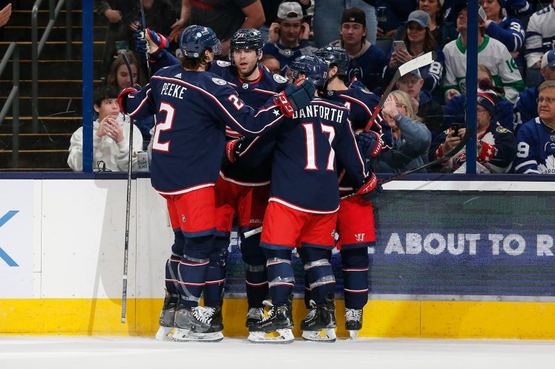 Dec 29, 2023; Columbus, Ohio, USA; Columbus Blue Jackets center Adam Fantilli (11) celebrates his goal against the Toronto Maple Leafs during the third period at Nationwide Arena. Mandatory Credit: Russell LaBounty-USA TODAY Sports